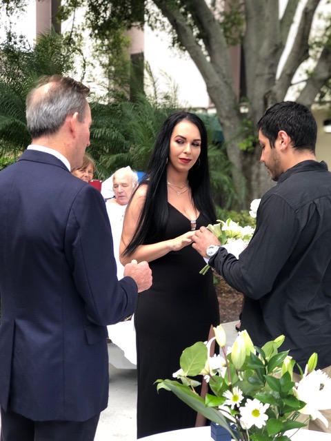 Michael leading a wedding ceremony at the hospital